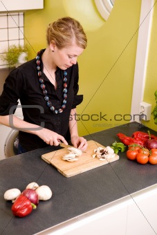 Woman Cutting Vegetables