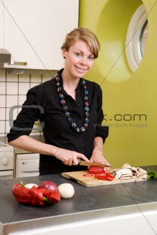 Woman Cutting Peppers
