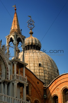 Detail of St. Mark's Basilica against a clear blue sky, Venice