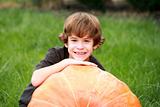 Boy and Large Pumpkin