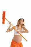 pregnant woman with a mop