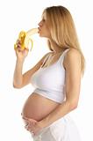 pregnant woman is sexually bites banana