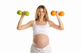 Pregnant woman involved in fitness dumbbells
