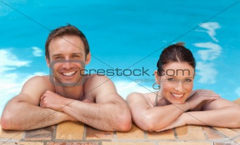 Lovely couple in the swimming pool
