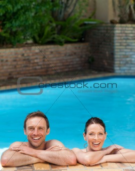 Lovely couple  in the swimming pool