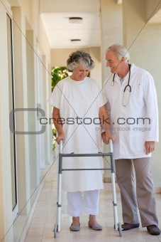Doctor walking with his patient 