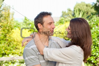 Enamored couple in the garden