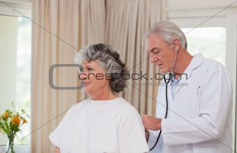 Doctor examining his  patient