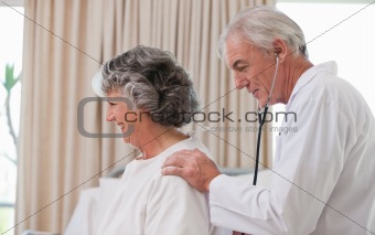 Doctor examining his  patient