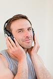 Handsome man listening to some music