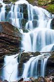 Waterfalls on Rocky Autumn Stream 