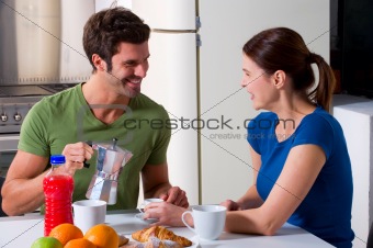 couple having breakfast in the kitchen