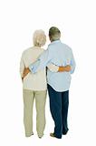 happy elderly couple embraced from behind