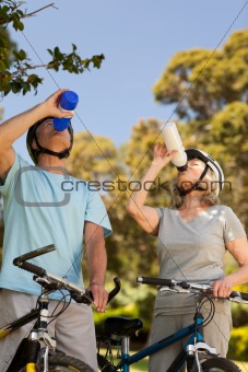 Senior couple drinking water