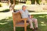 Senior man sitting on a bench