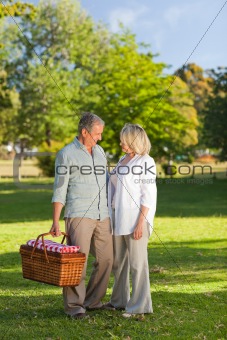 Retired couple looking for a place to  picnicking