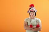 Upset young Caucasian woman in Monkey Cap