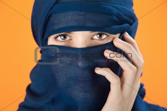 Blue scarf covered woman