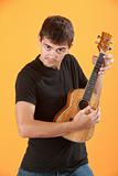 Serious Teen ukulele player