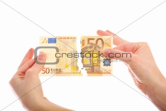 Tearing fifty-euro note
