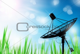 satellite dish antennas in field under sky and light reflect in morning