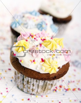 Holiday cupcakes on white background
