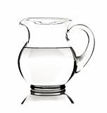 Glass water pitcher with water on white background