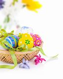 easter eggs in basket with bow