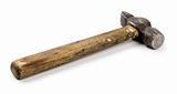 Old shabby working hammer of handwork on the wooden handle