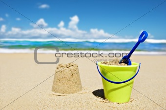 Toy bucket and shovel on the beach