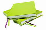 Green notebook on a pure white background