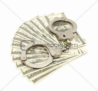 Handcuffs on money background