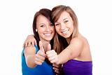 two young women showing thumbs up, smiling - isolated on white