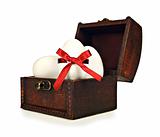 White candy easter eggs in a chest