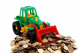 Gree bulldozer raked pile of coins