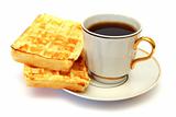 white cup of coffee with waffle