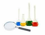 Various tubes and magnifier isolated on the white background