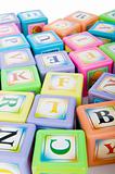 Learning and education concept - pile of alphabet blocks