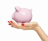 piggy bank on woman hand isolated on white