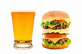 cheeseburger and golden beer mug isolated on white