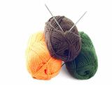 Three clews of woolen yarn