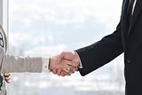 business man and woman handshake on  meeting