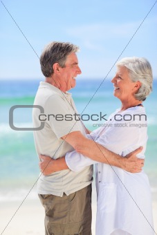 Elderly man embracing her wife