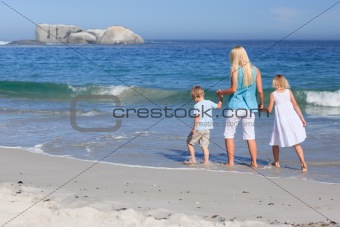 Family walking on the beach