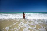 far bikini woman at Conil beach