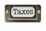 Taxes File Drawer Label Isolated on a White Background.