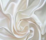 Smooth elegant white silk as wedding background 