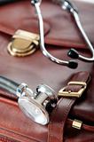 Doctor's brown leather case with the stethoscope