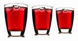 Three glasses of red fruit juice with ice