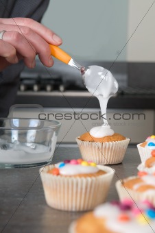 Decorating the cupcakes